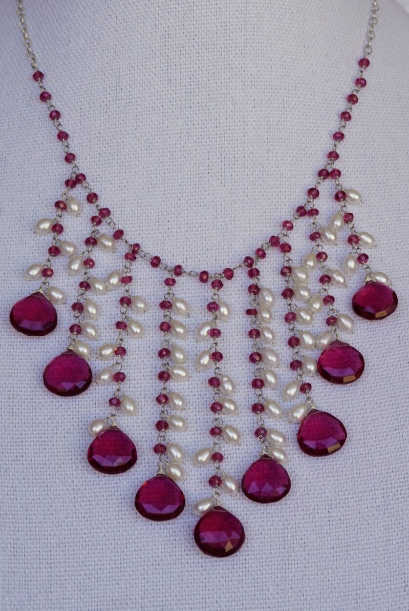 Rubelite and Pearl Necklace on white background