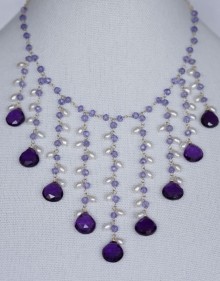 Amethyst and Tanzanite Necklace on display