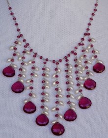 Rubelite and Pearl Necklace on white background